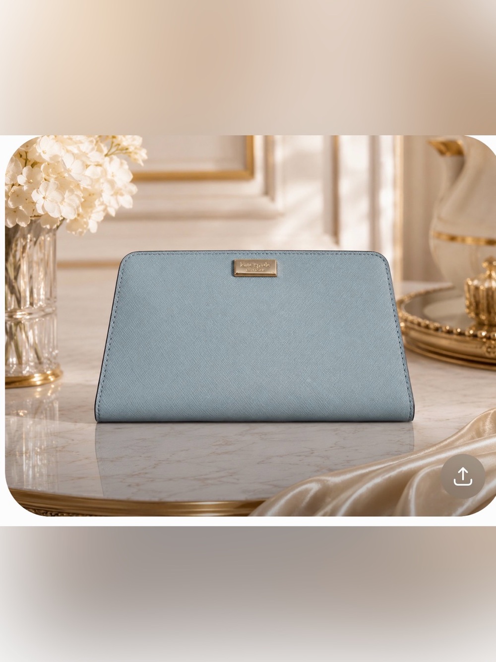 Kate spade light blue Saffiano leather wallet with gold logo plaque